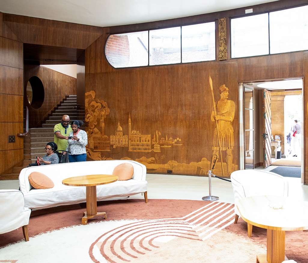 Circular Art Deco entrance hall at Eltham Palace with marquetry panels